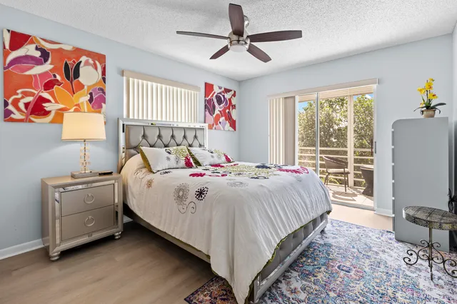 a bedroom with a bed and dresser