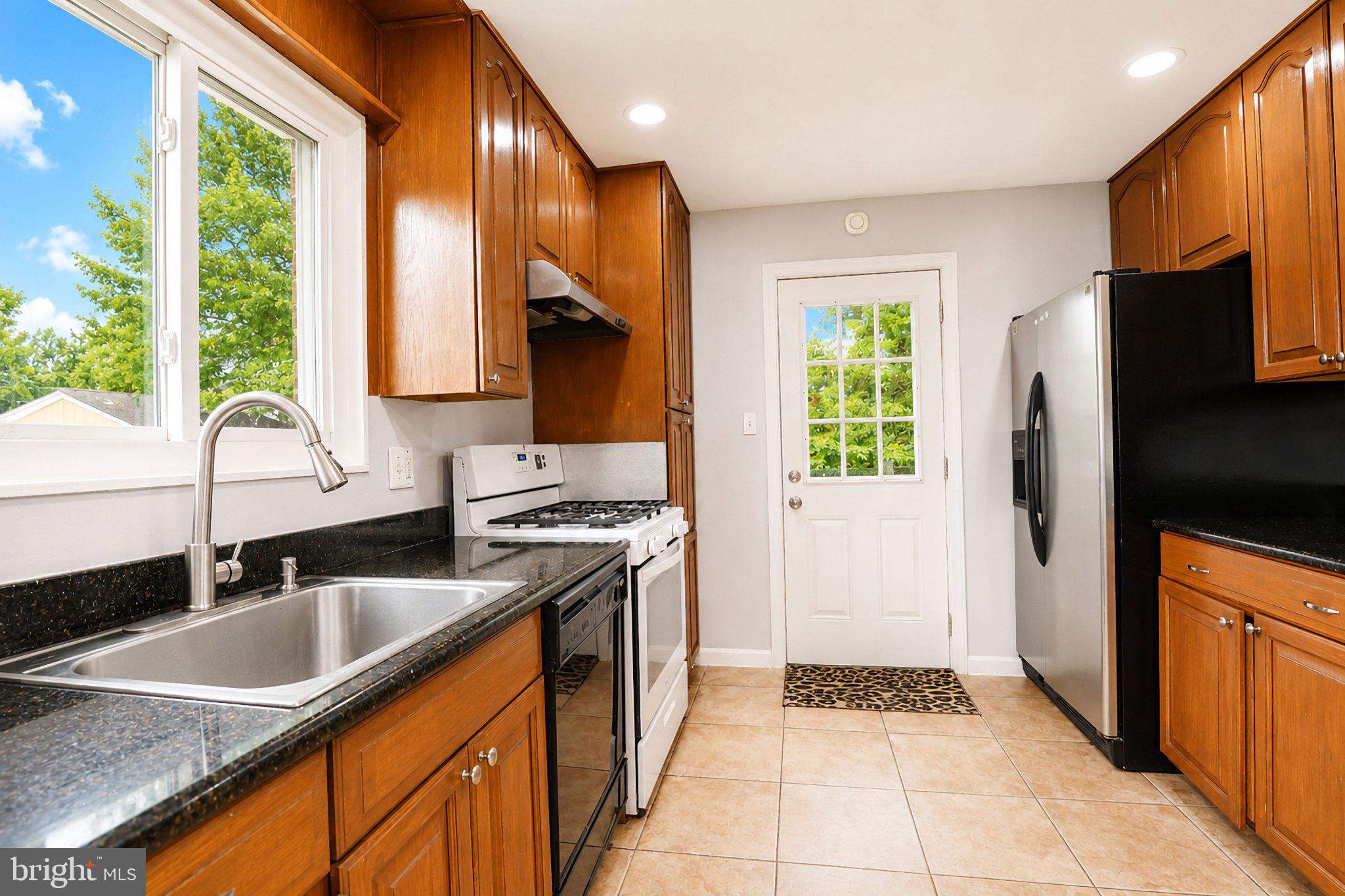 5712 Ash Drive Springfield, VA 22150 - Photo 9 of 38 Bright and inviting kitchen space.