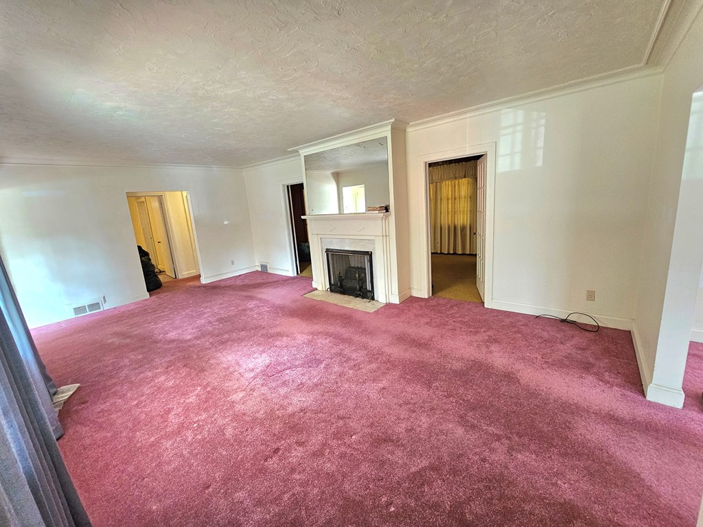 752 Portland Avenue Columbus, GA 31906 - Photo 11 of 31 a bed room with a bed and mirror