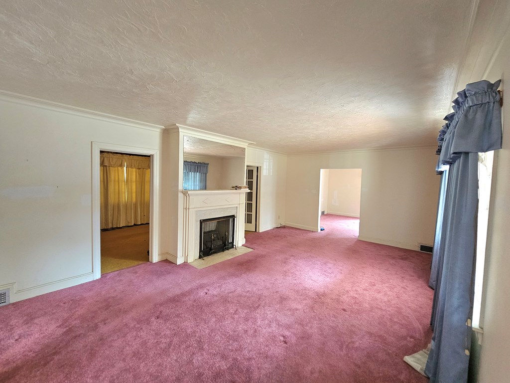 752 Portland Avenue Columbus, GA 31906 - Photo 12 of 31 a view of empty room with a fireplace