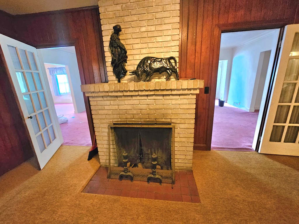 752 Portland Avenue Columbus, GA 31906 - Photo 23 of 31 a view of a livingroom with furniture and a fireplace