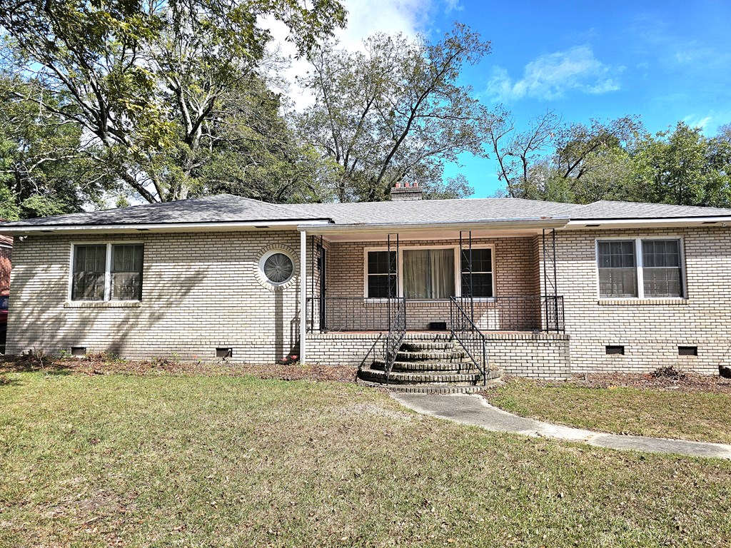 752 Portland Avenue Columbus, GA 31906 - Photo 3 of 31 a front view of house with yard outdoor seating and barbeque oven