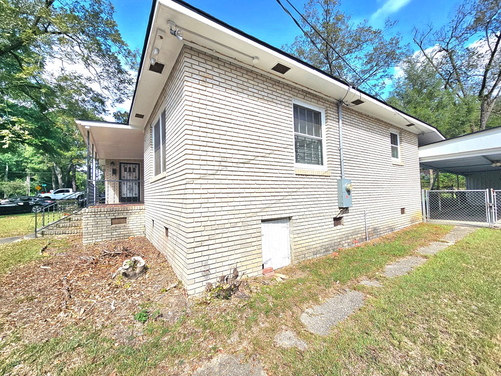 752 Portland Avenue Columbus, GA 31906 - Photo 5 of 31 a view of a house with a yard and sitting area