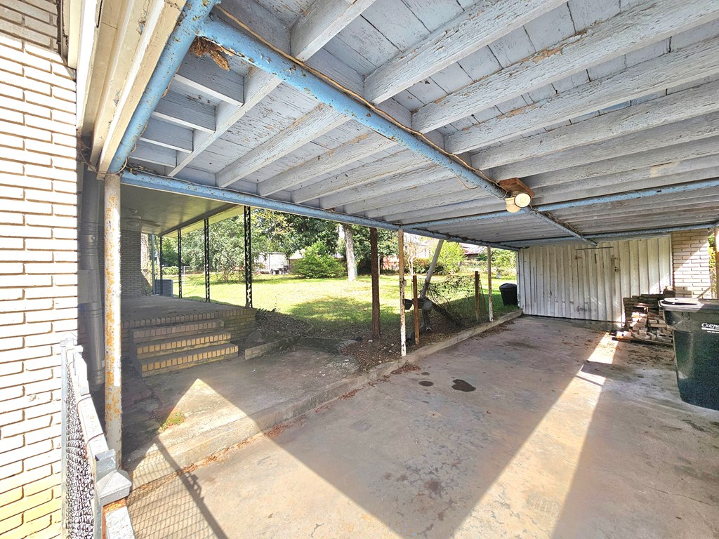 752 Portland Avenue Columbus, GA 31906 - Photo 8 of 31 a view of a porch with wooden floor
