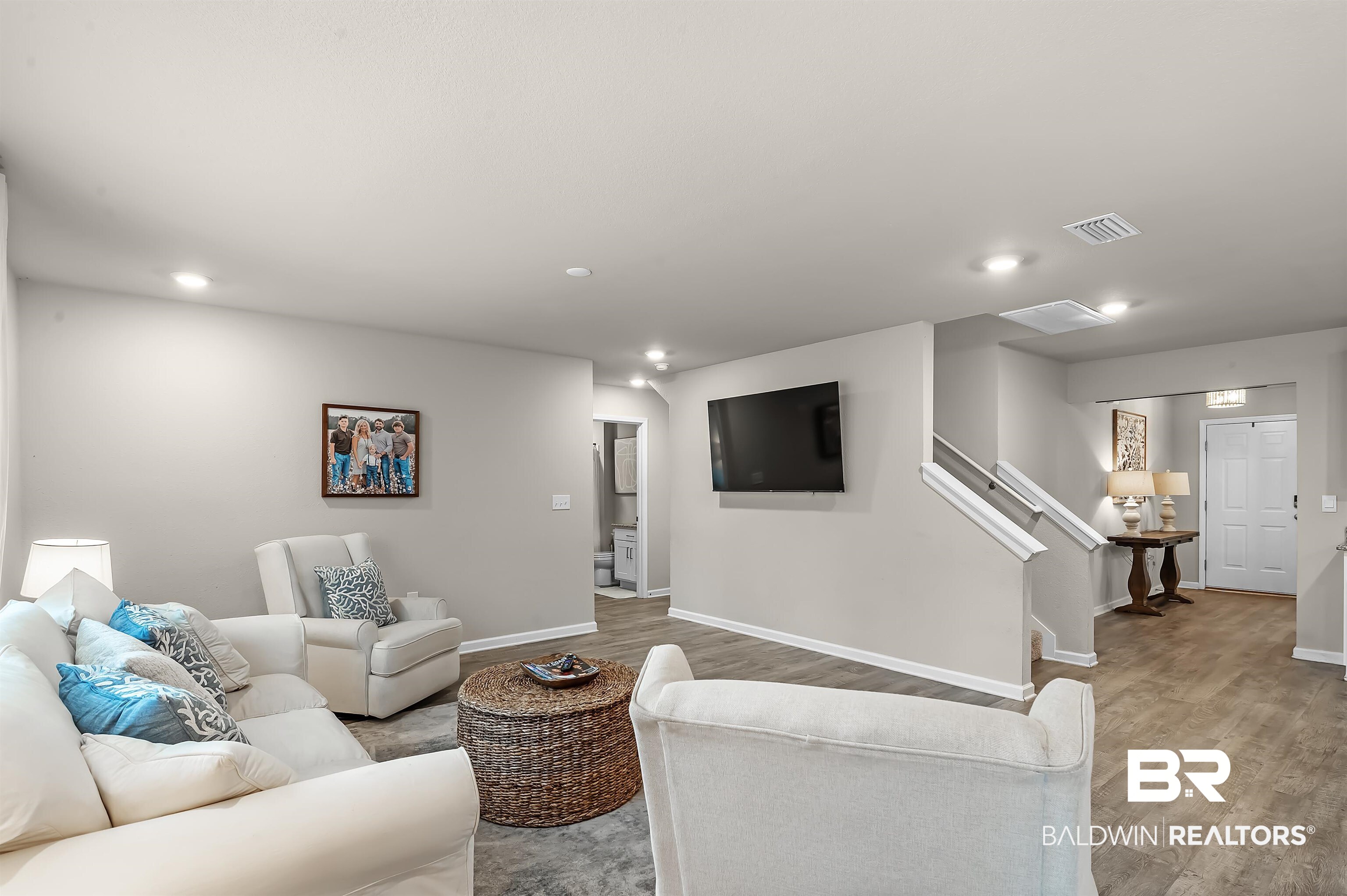 24549 Broken Sound Loop Orange Beach, AL 36561 - Photo 10 of 57 Living room featuring light wood-type flooring