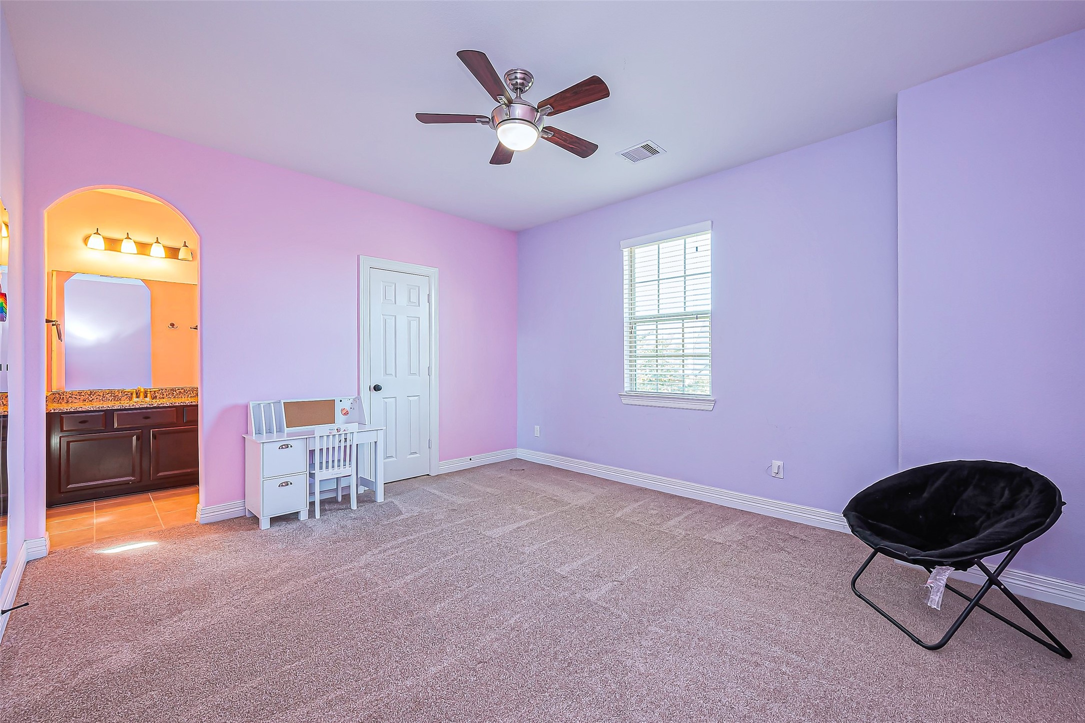 10018 Durango Path Lane Cypress, TX 77433 - Photo 27 of 50 Spacious and inviting secondary bedroom with ample natural light.