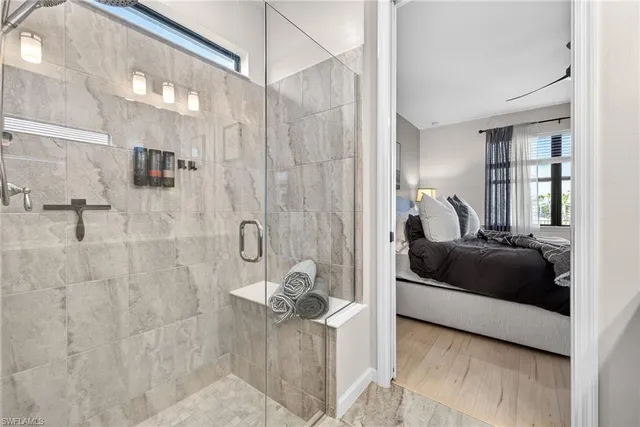 a living room with a couch and a shower