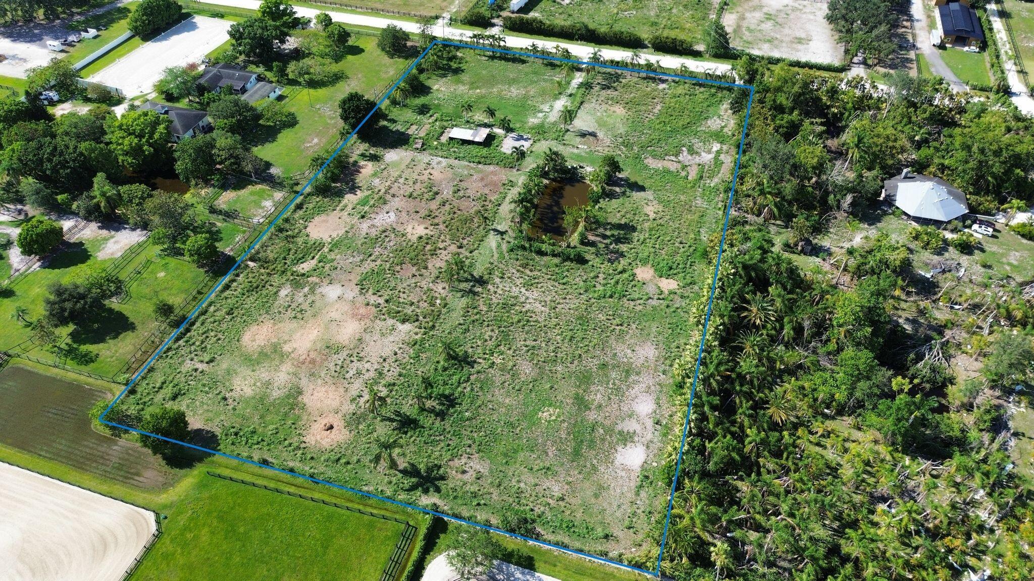 16290 Rustic Road Wellington, FL 33470 - Photo 20 of 20 a plant that is in a garden