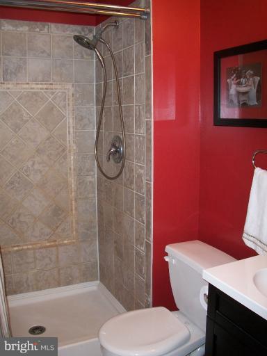 897 Beech Tree Road Severn, MD 21144 - Photo 19 of 30 a bathroom with a toilet and a shower