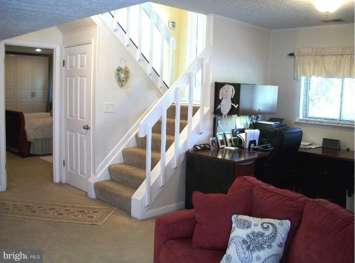 897 Beech Tree Road Severn, MD 21144 - Photo 3 of 30 a living room with furniture and a window