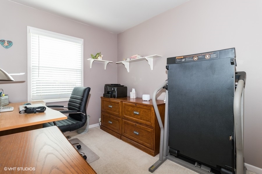 228 Murphy Drive Romeoville, IL 60446 - Photo 12 of 20 a bedroom with a workspace