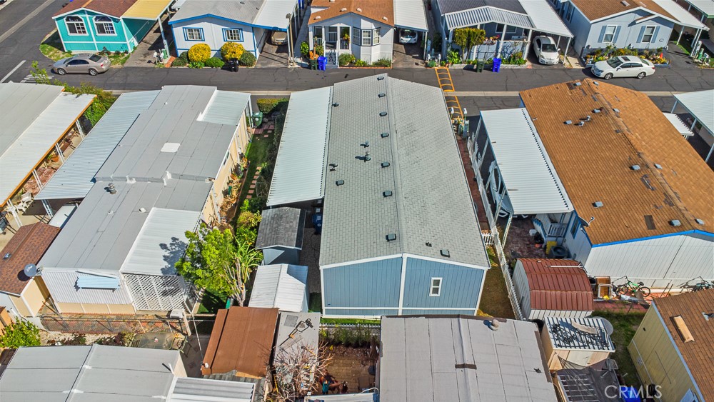 20401 Soledad Canyon Road, Unit 355 Canyon Country, CA 91351 - Photo 30 of 36 an aerial view of residential houses with outdoor space and street view