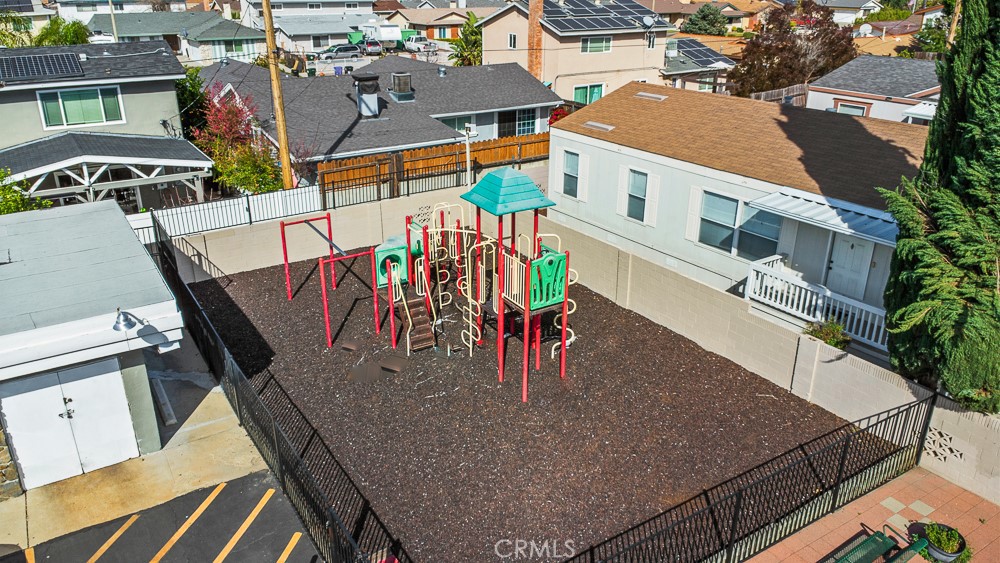 20401 Soledad Canyon Road, Unit 355 Canyon Country, CA 91351 - Photo 34 of 36 an aerial view of a house with outdoor seating
