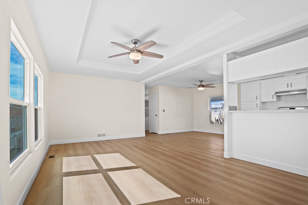 20401 Soledad Canyon Road, Unit 355 Canyon Country, CA 91351 - Photo 8 of 36 a view of empty room with wooden floor and fan