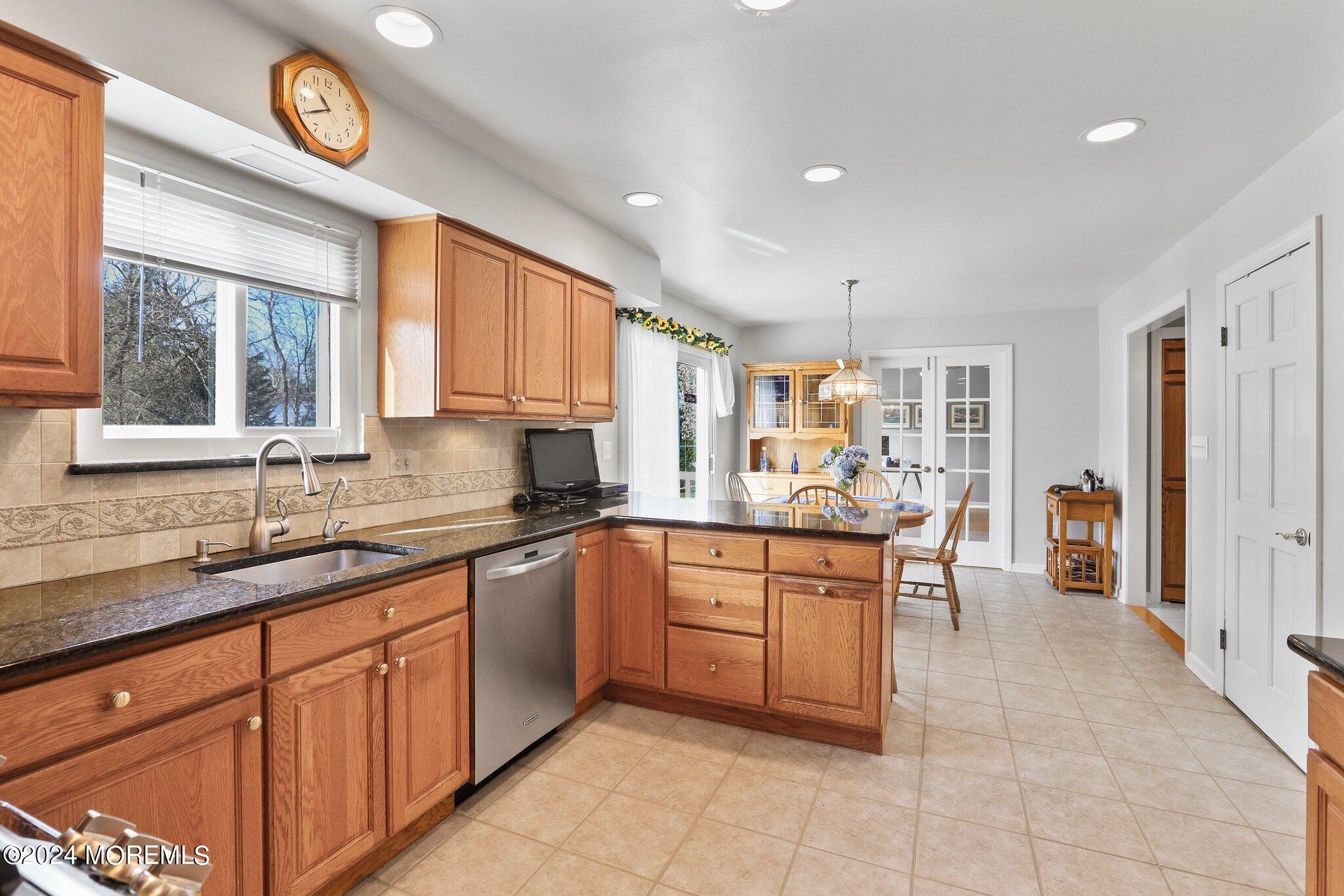 234 Yale Drive Lincroft, NJ 07738 - Photo 11 of 38 a kitchen with lots of counter top space and sink