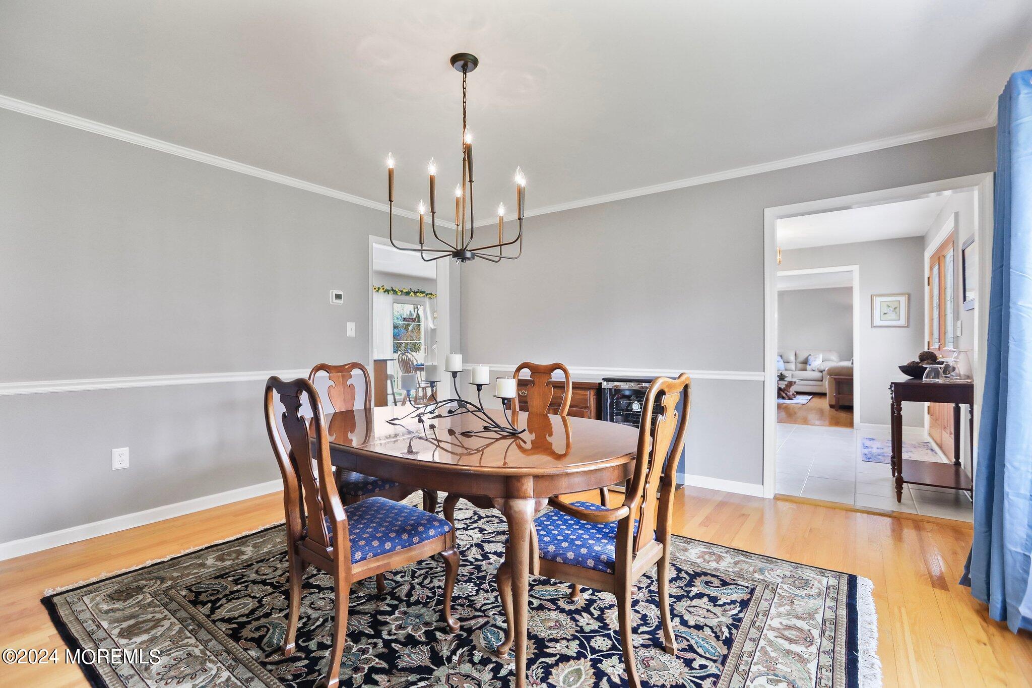 234 Yale Drive Lincroft, NJ 07738 - Photo 15 of 38 a view of a dining room with furniture