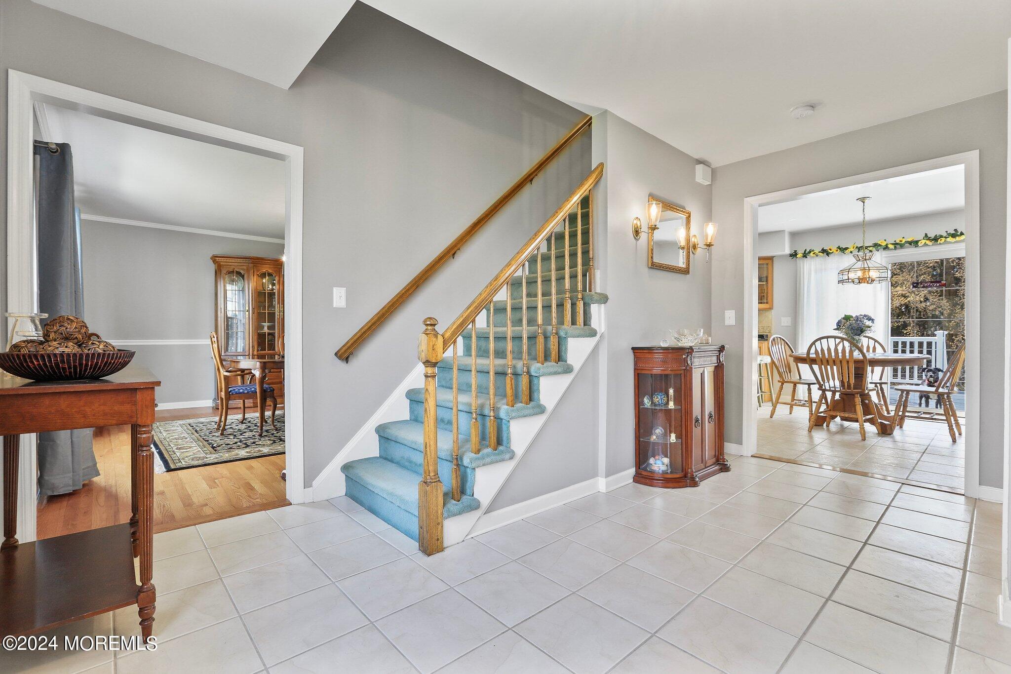 234 Yale Drive Lincroft, NJ 07738 - Photo 5 of 38 a view of entryway and hall with dining room