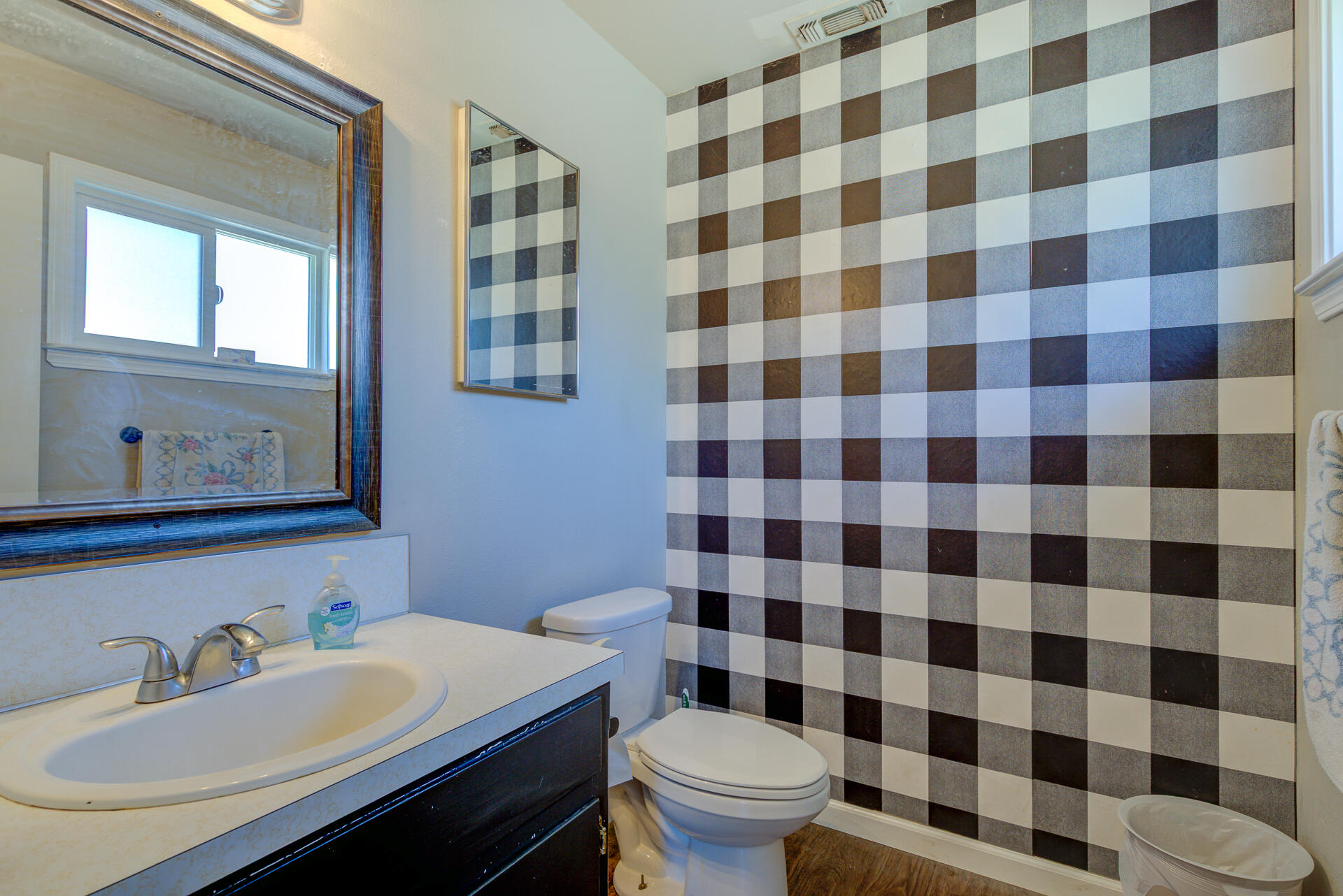 2689 Shasta View Drive Redding, CA 96002 - Photo 11 of 33 a bathroom with a sink a toilet a mirror and shower