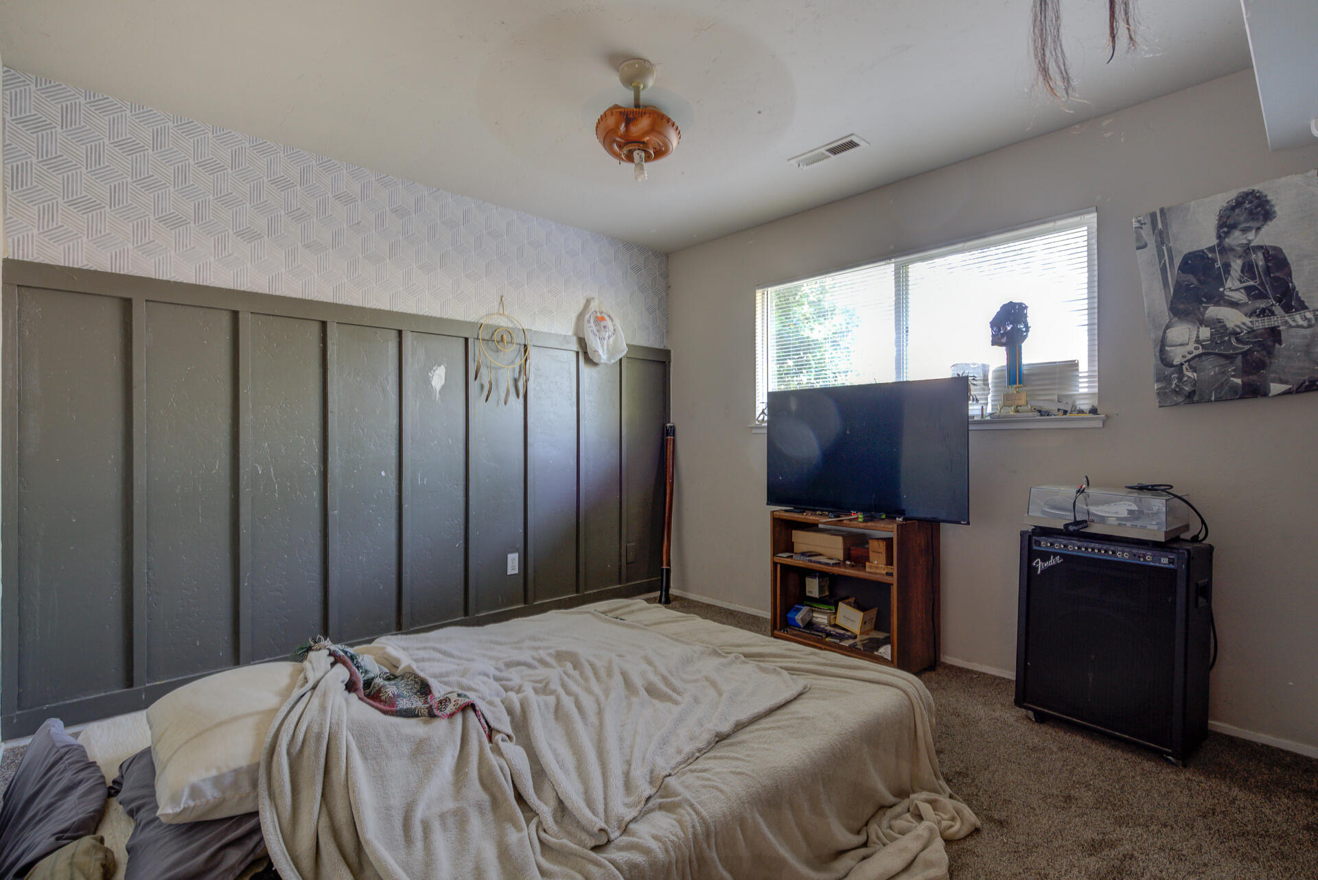 2689 Shasta View Drive Redding, CA 96002 - Photo 12 of 33 a bedroom with a bed and a flat screen tv