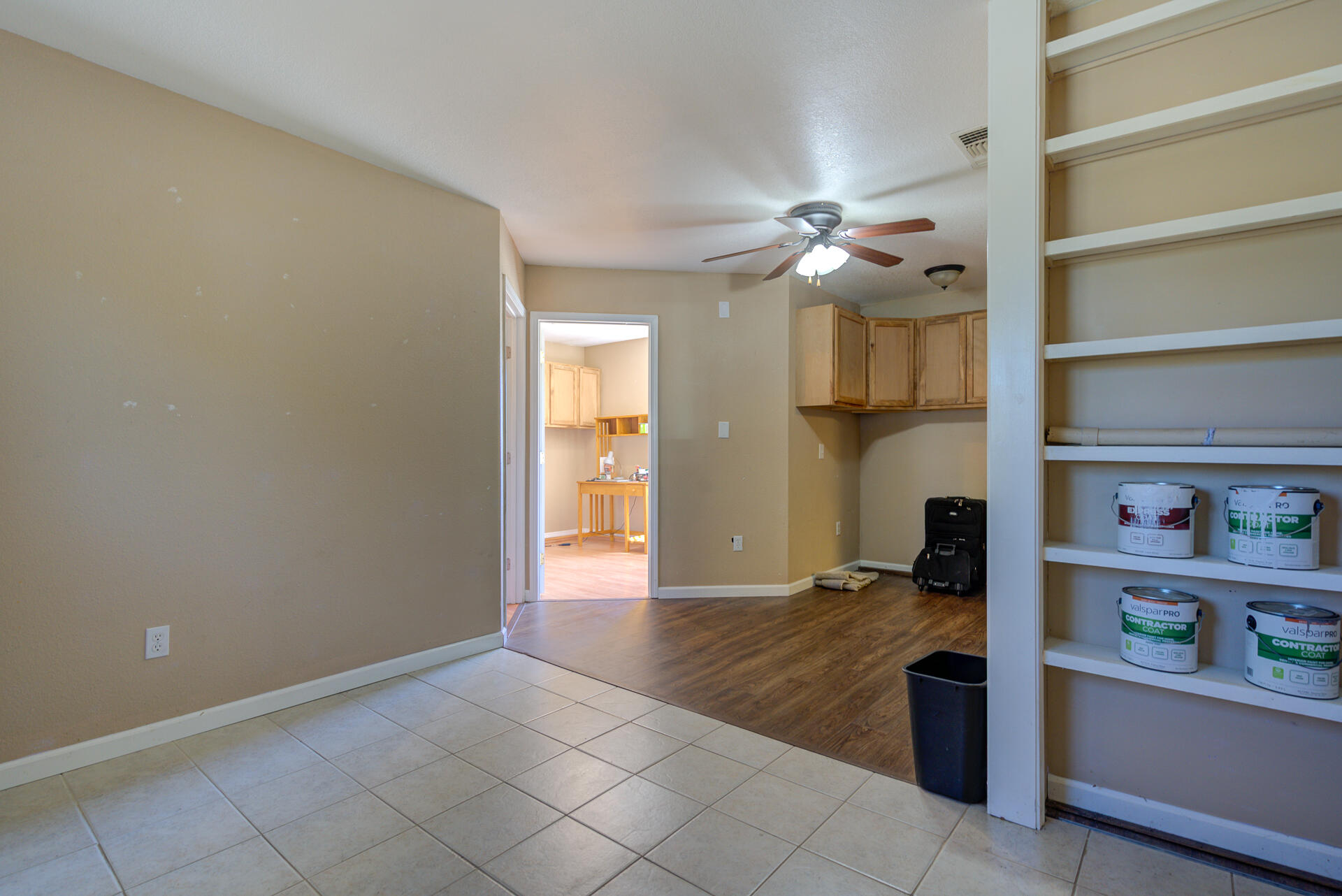 2689 Shasta View Drive Redding, CA 96002 - Photo 17 of 33 a view of an empty room with cabinet and a chandelier fan