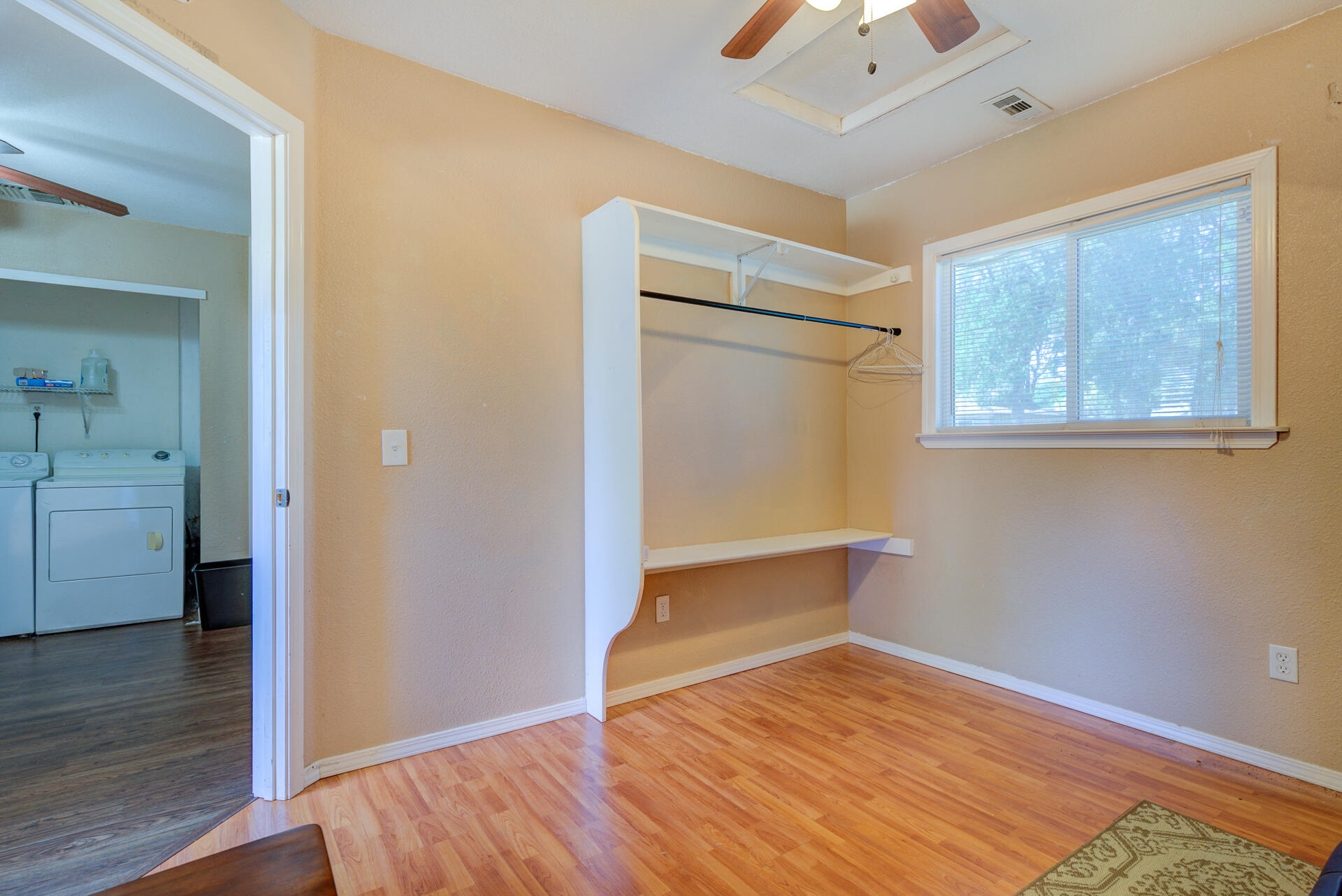 2689 Shasta View Drive Redding, CA 96002 - Photo 21 of 33 a view of empty room with wooden floor