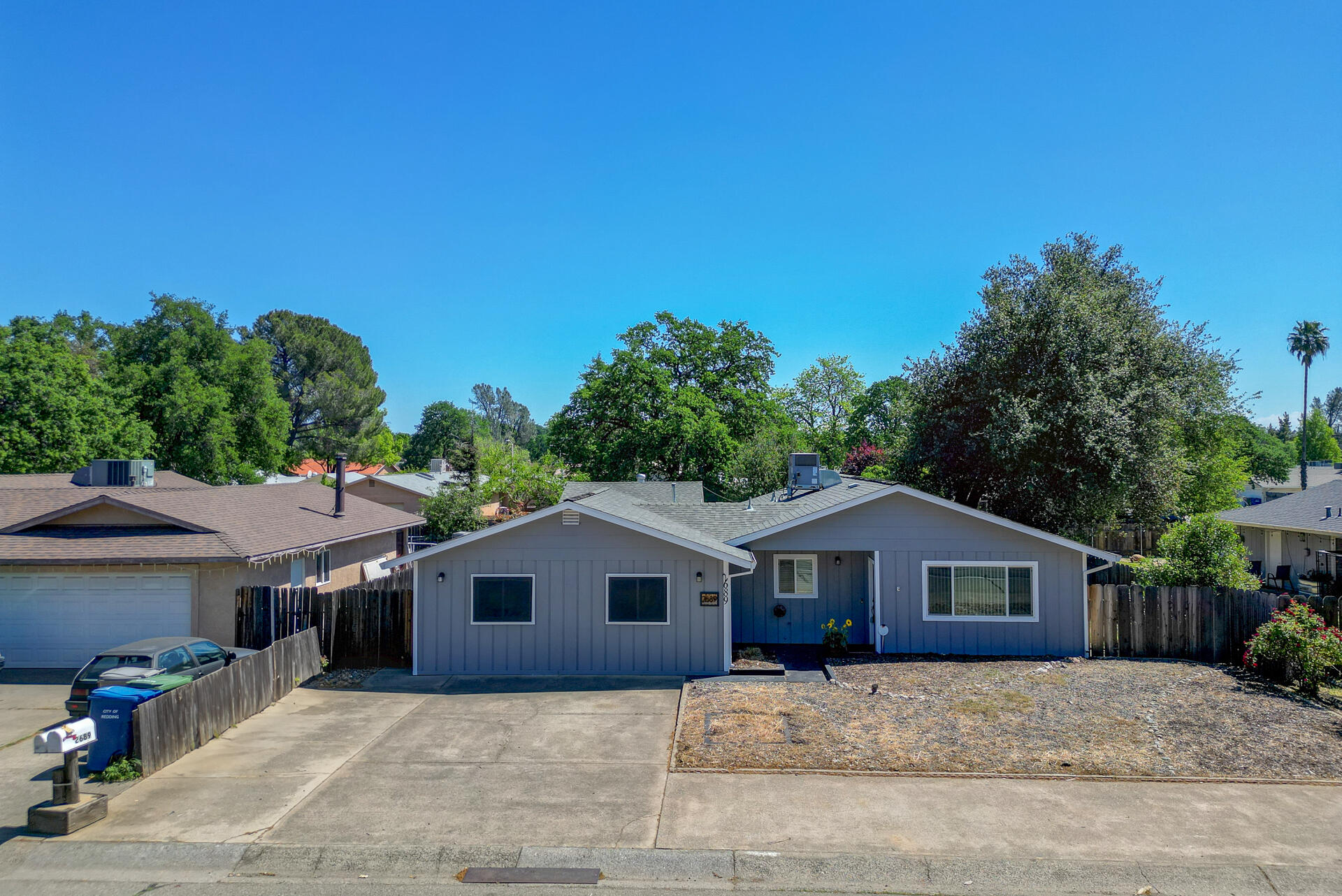 2689 Shasta View Drive Redding, CA 96002 - Photo 31 of 33 a front view of a house with a yard