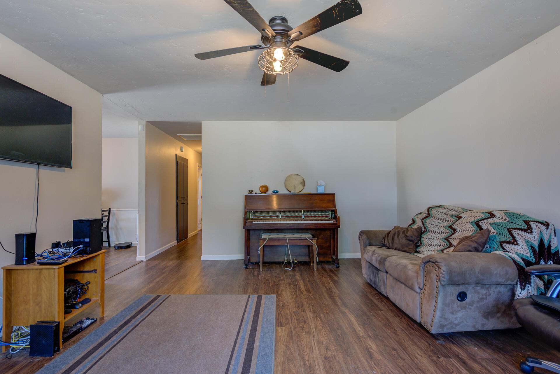 2689 Shasta View Drive Redding, CA 96002 - Photo 4 of 33 a bedroom with furniture and a wooden floor