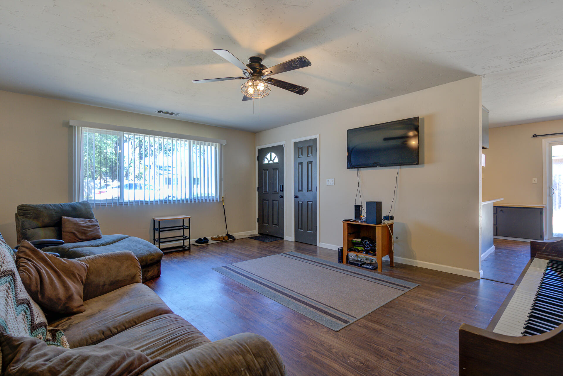 2689 Shasta View Drive Redding, CA 96002 - Photo 5 of 33 a living room with furniture and a flat screen tv