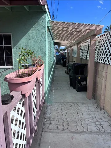 a view of a chairs and table in the patio