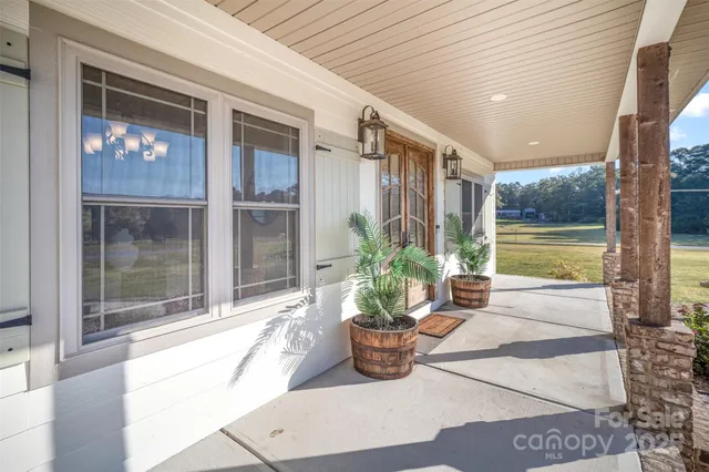 a view of a entryway door front of house