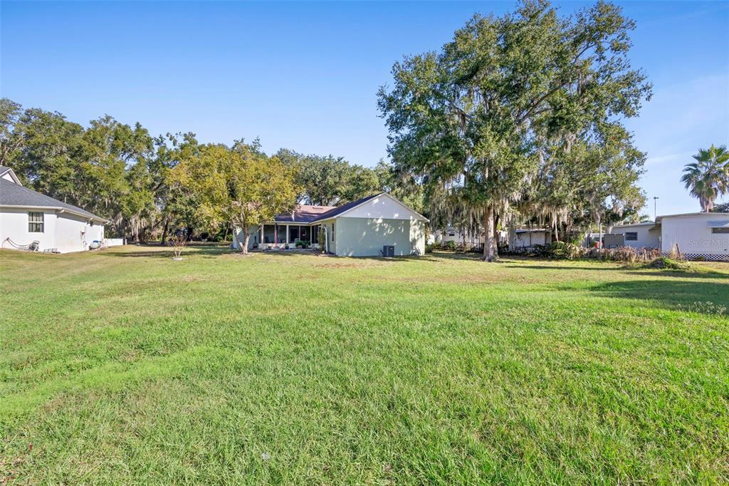 10320 Bumblebee Lane Leesburg, FL 34788 - Photo 44 of 49 a house view with a outdoor space