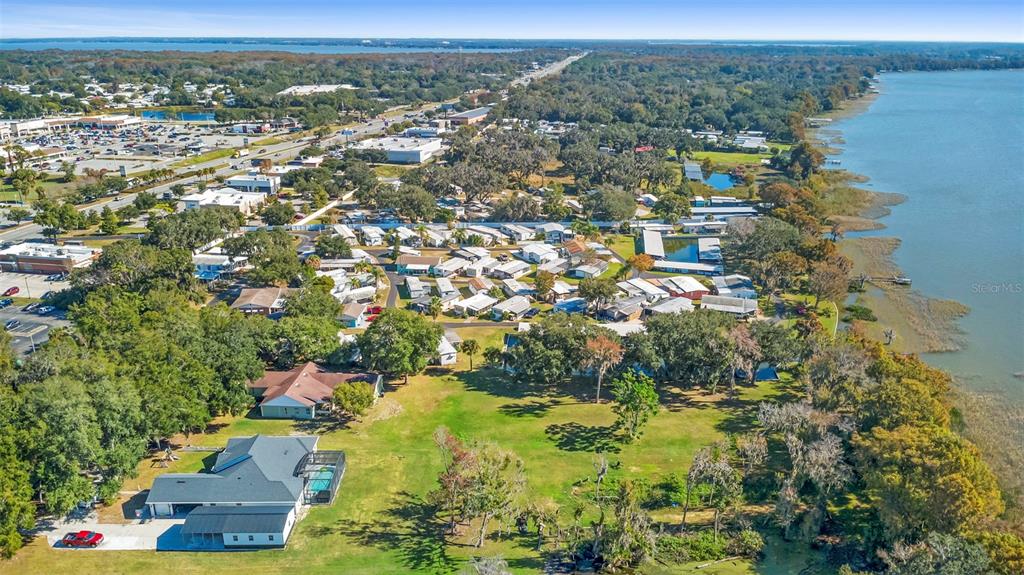 10320 Bumblebee Lane Leesburg, FL 34788 - Photo 48 of 49 an aerial view of residential houses with outdoor space