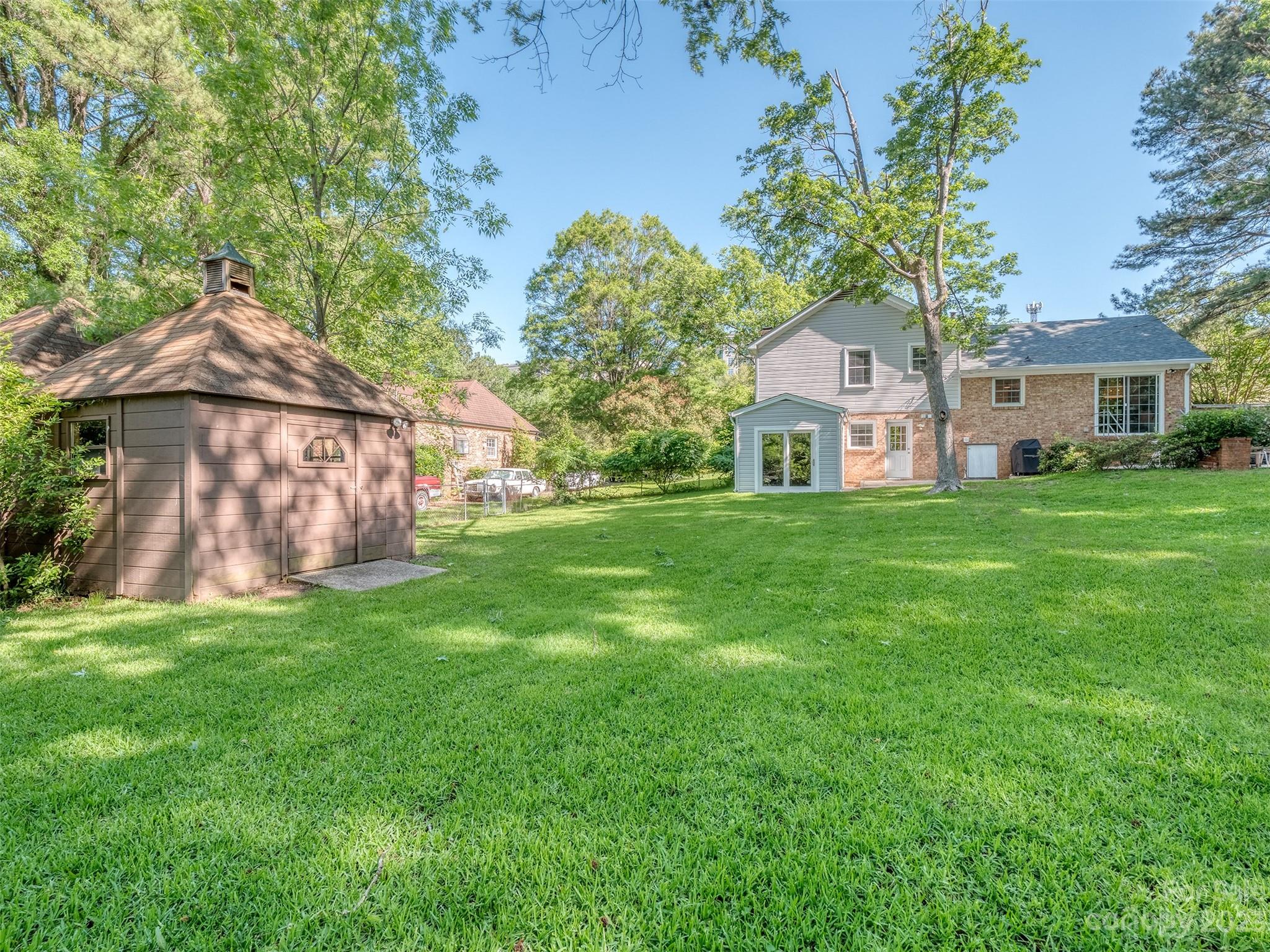2819 Eastburn Road Charlotte, NC 28210 - Photo 29 of 34 a front view of a house with a garden
