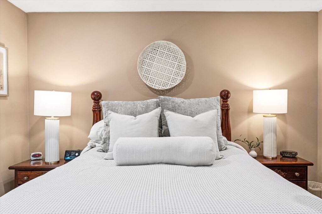 42 Crescent Saugus Ma Saugus, MA 01906 - Photo 15 of 38 a bedroom with a bed and a lamp