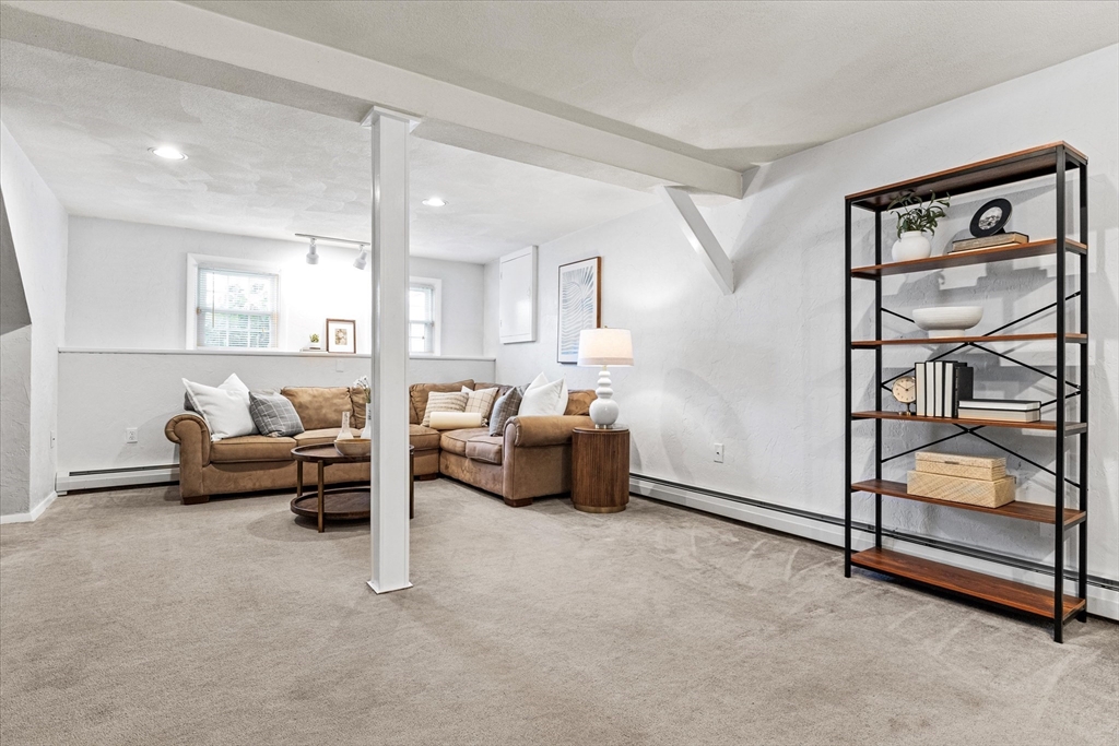 42 Crescent Saugus Ma Saugus, MA 01906 - Photo 23 of 38 a living room with furniture and a window