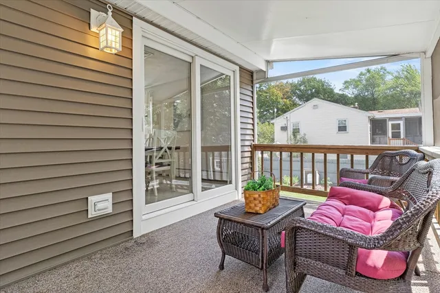 a outdoor living space with furniture and a potted plant