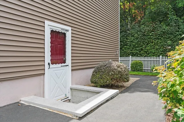 a view of a house with a street