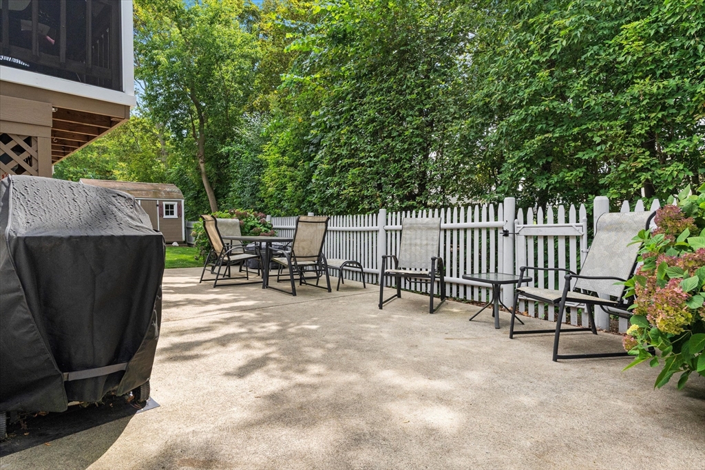 42 Crescent Saugus Ma Saugus, MA 01906 - Photo 33 of 38 a view of a patio with a table and chairs