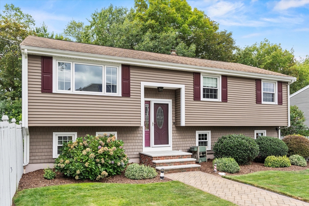 42 Crescent Saugus Ma Saugus, MA 01906 - Photo 36 of 38 a front view of a house with a yard