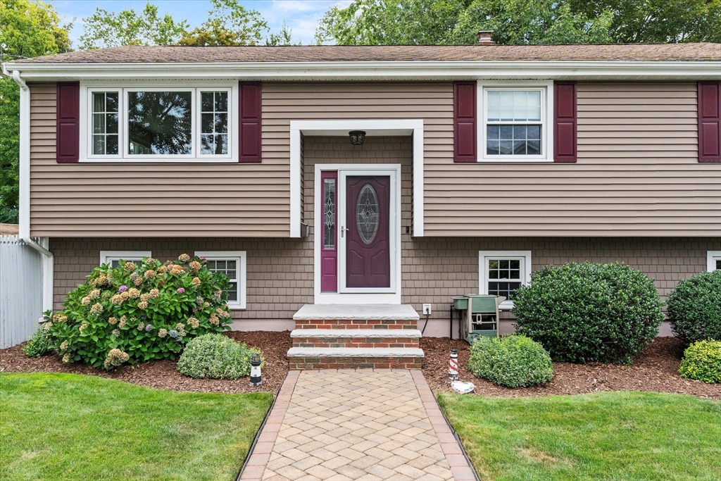 42 Crescent Saugus Ma Saugus, MA 01906 - Photo 37 of 38 a front view of a house with a yard