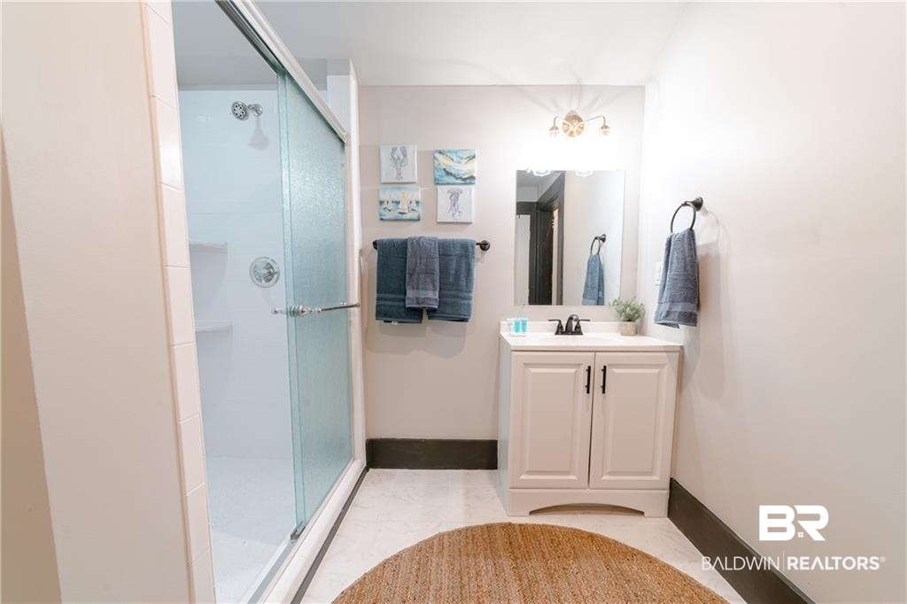 207 Michigan Avenue Mobile, AL 36604 - Photo 25 of 31 Bathroom with vanity and a stall shower