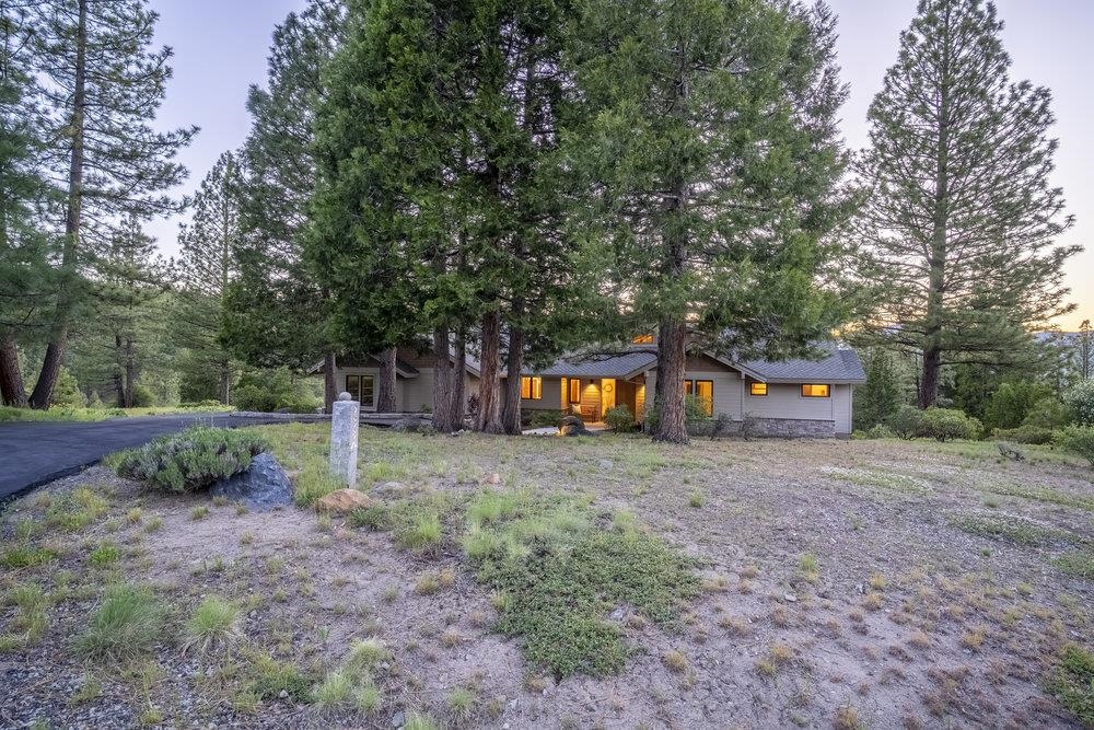 238 Clouds Rest Portola, CA 96122 - Photo 29 of 34 a front view of a house with a yard and a tree