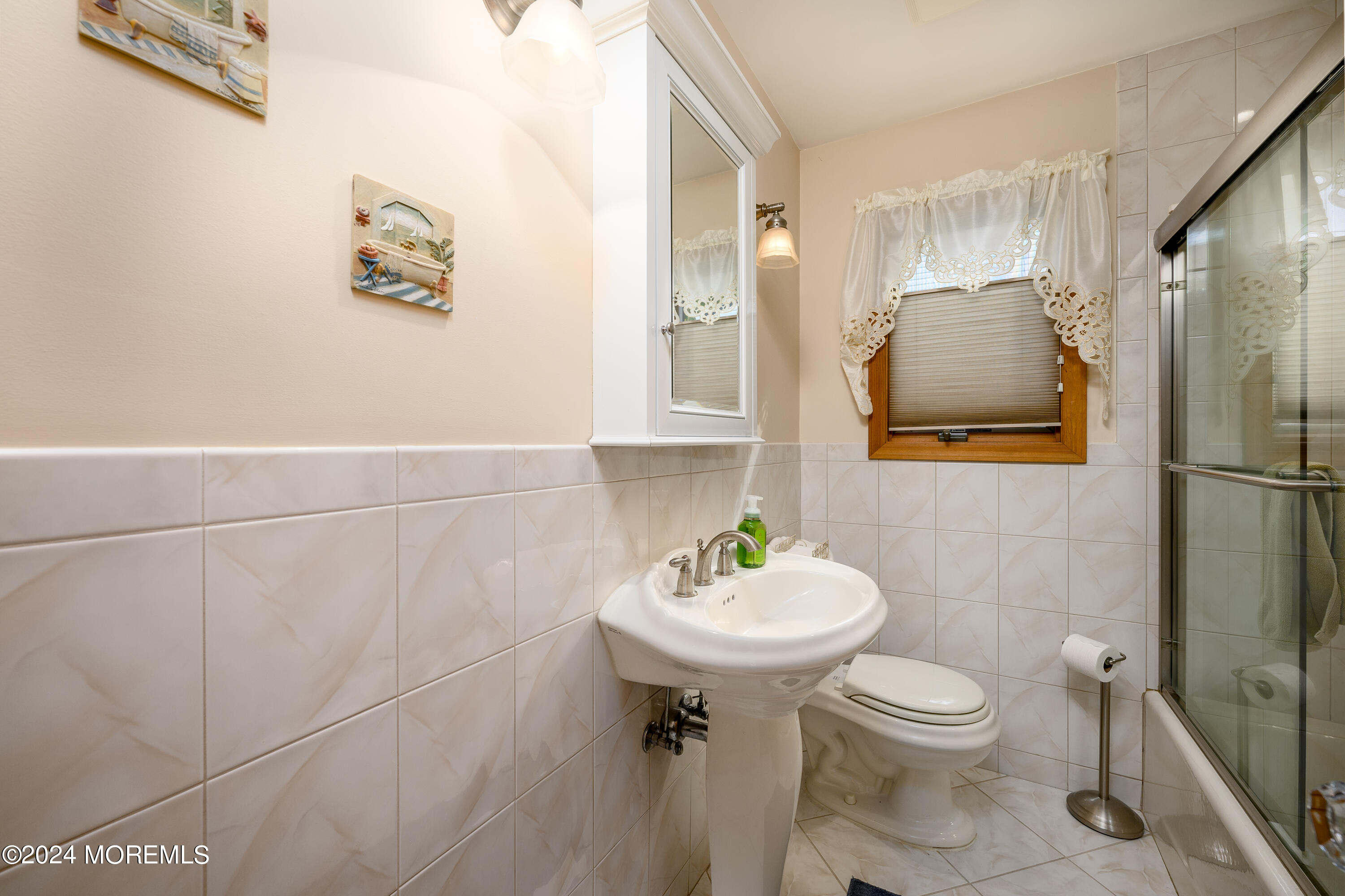 8 Parkview Drive Hazlet, NJ 07730 - Photo 19 of 40 a bathroom with a sink mirror and toilet
