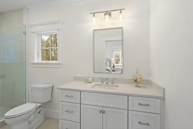 a kitchen with stainless steel appliances a sink stove and cabinets