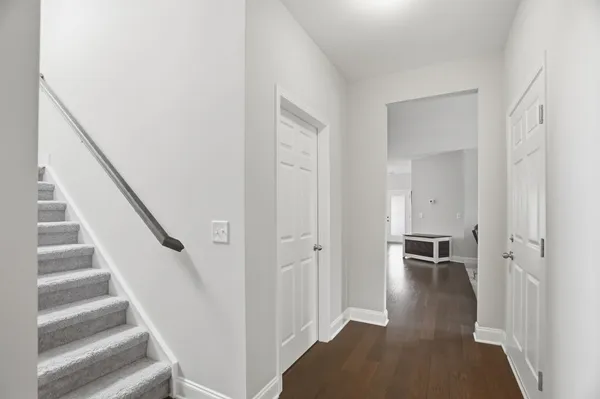 a view of entryway with stairs