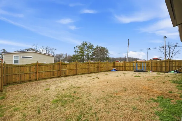 a view of an house with backyard space