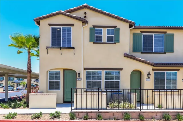a front view of a house with a porch