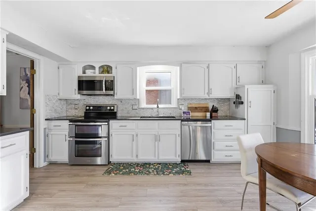 $445,000 | 11212 Grandview Drive, Overland Park, KS 66210