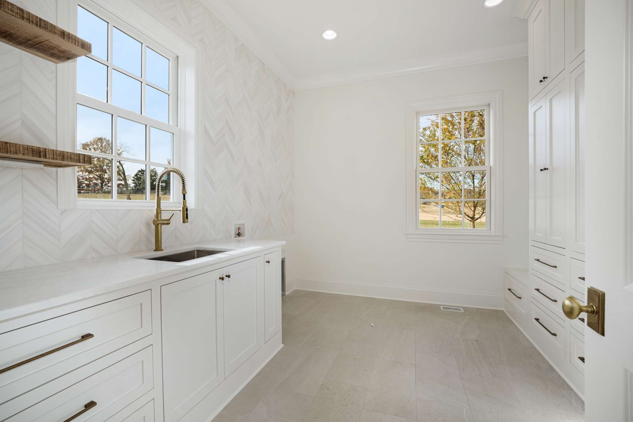 1995 Old Hillsboro Road Franklin, TN 37064 - Photo 38 of 70 a kitchen with a sink and cabinets