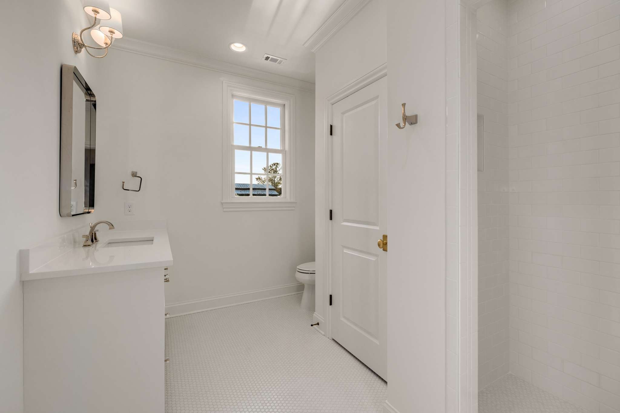 1995 Old Hillsboro Road Franklin, TN 37064 - Photo 48 of 70 a bathroom with a sink a toilet and shower